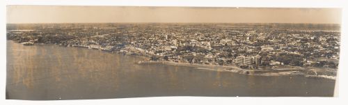 Aerial view of an unidentified city coastline for an unidentified project