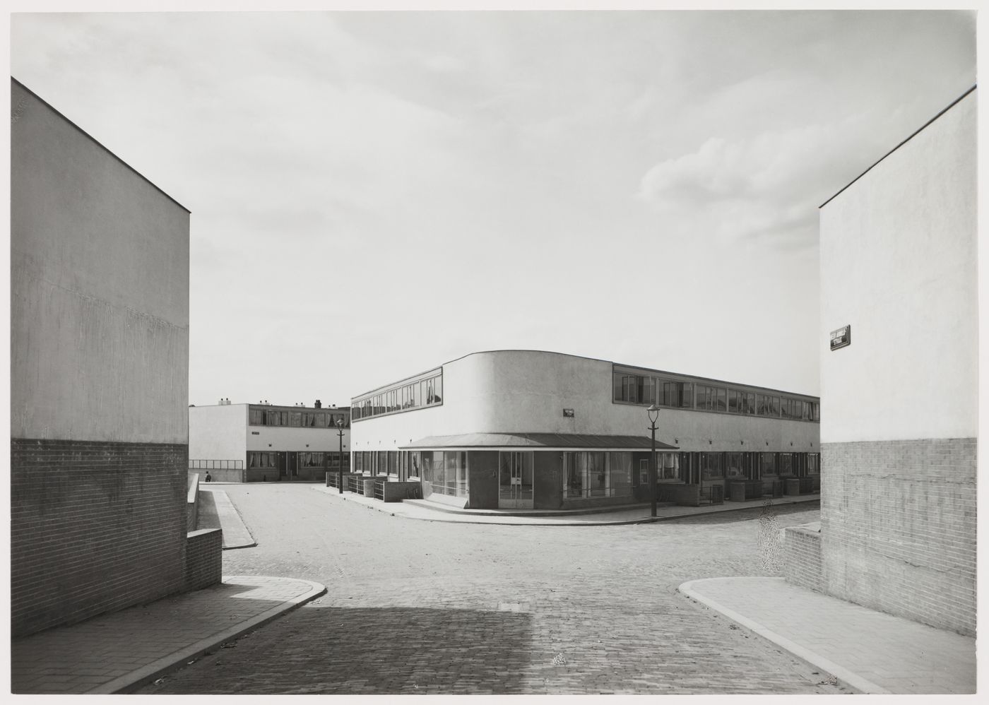 View of the principal façade of Kiefhoek Housing Estate showing a corner store, Rotterdam, Netherlands