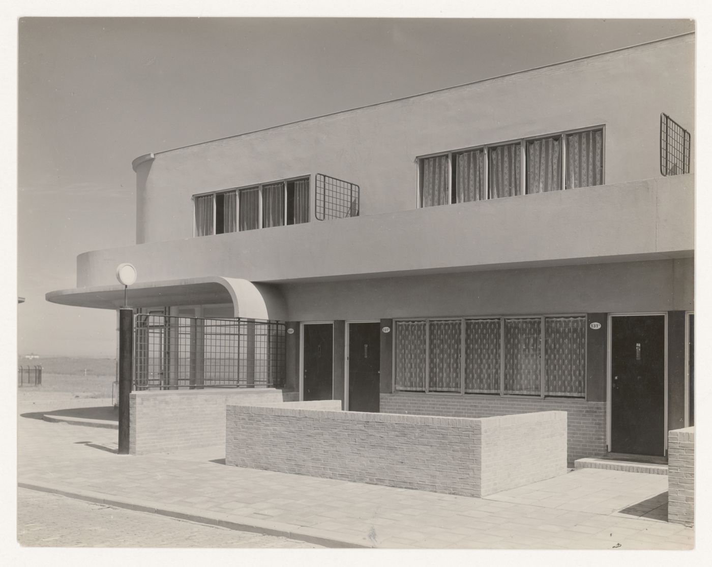 View of the principal façade of industrial row houses, Hoek van Holland, Netherlands