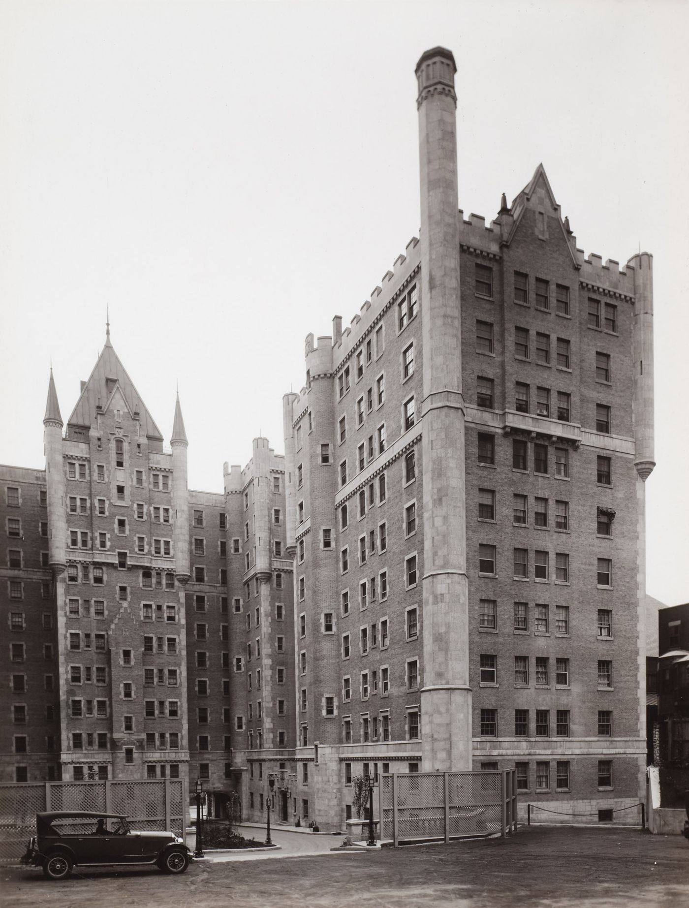 24P-04: Château Apartments, rear view of central and west wings including courtyard