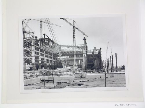 View of cranes and construction of steel structure for power station, from exterior, United Kingdom
