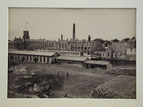 Armory, Water-shops, overview of yard and river, three workers with shovels standing, Springfield, Massachusetts