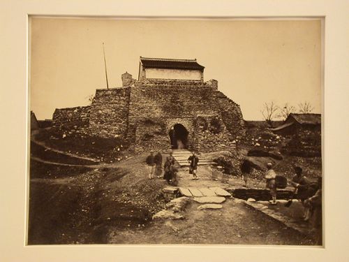 View of a brick gateway and several people, Yent'ai (also formerly known as Chefoo, now Yantai), China