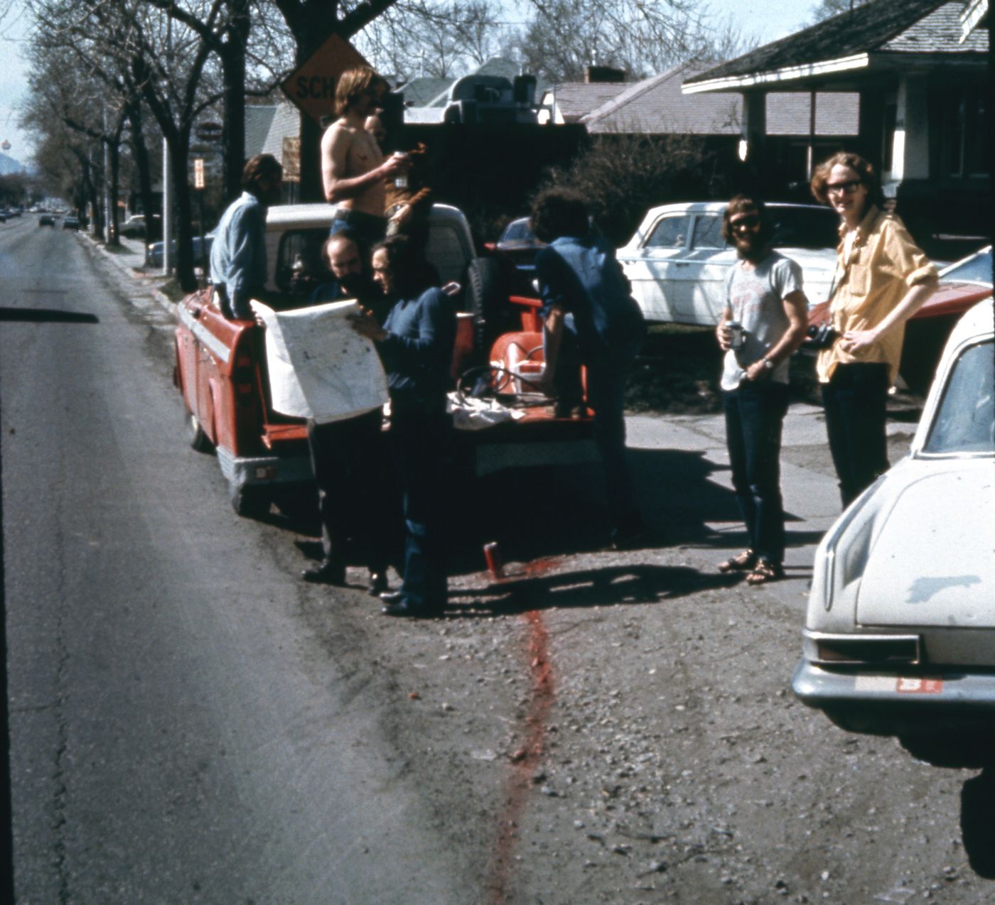 Photograph of students with truck during performance of Red Line