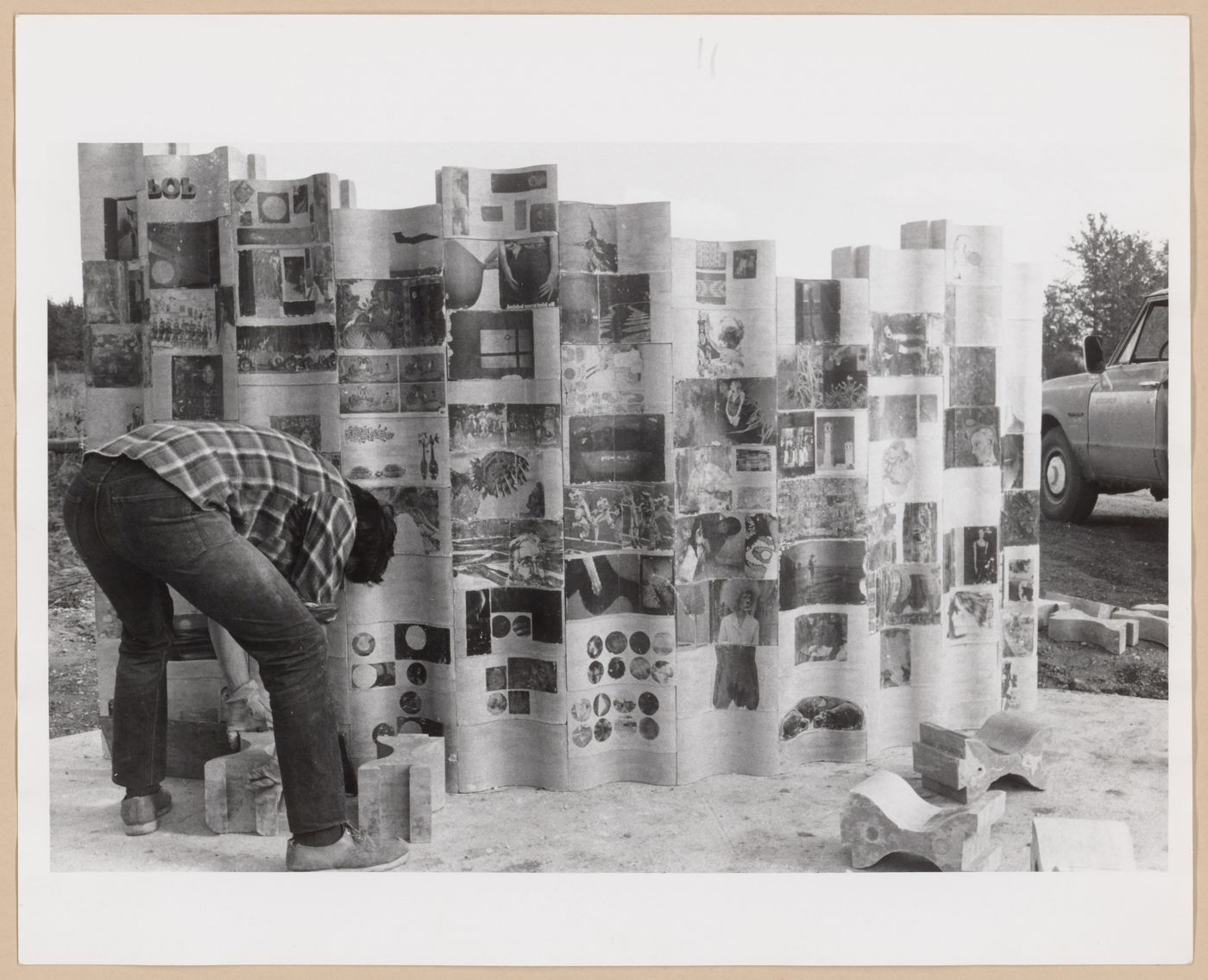 Photograph of the transferring technique used to decorate one wall of the Saddle Lake demonstration project for the Minimum Cost Housing Group's publication "Sulphur Concrete & Very Low-cost Housing"