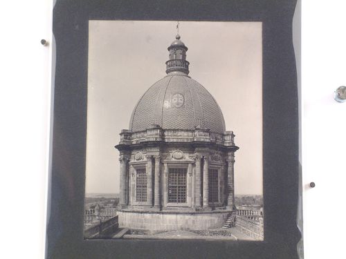 View of the dome of the Iglesia del Carmen with roof-tops and trees in the background, Celaya, Mexico
