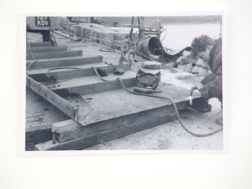 View of welder working on steel plates for Barnstaple Long Bridge, Devon, United Kingdom