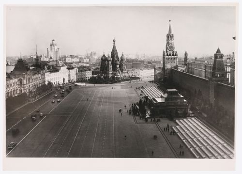 View of Red Square from an elevated viewpoint showing the Upper Shopping Arcades, Saint Basil Cathedral, the Spasskaia Tower, the Senate Tower, and the stone Lenin Mausoleum, Moscow