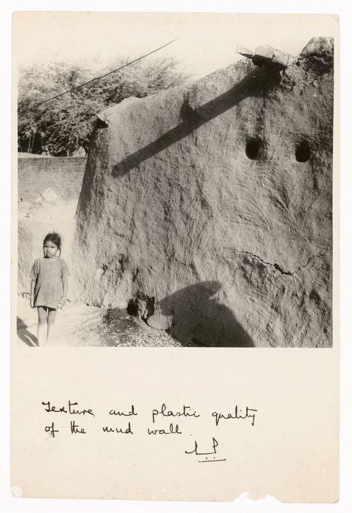 Photograph of a girl in front of a mud wall from the Kishangarh study with notes, Kishangarh, India
