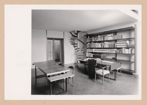 Interior view of the reading room showing tables, chairs, bookshelves and a staircase, Gabinetto disegni e stampe degli Uffizi, Galleria degli Uffizi, Florence, Italy