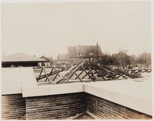 Exterior view of Darwin D. Martin House showing the glass roof of the conservatory under construction, Buffalo, New York