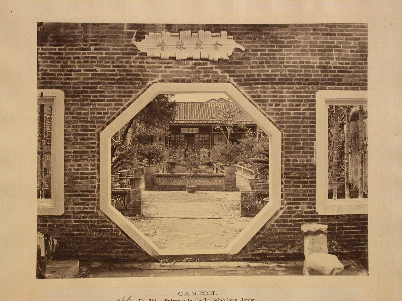 View of a garden through an octagonal gateway, possibly in the Hualin Buddhist Temple, Canton (now Guangzhou), China