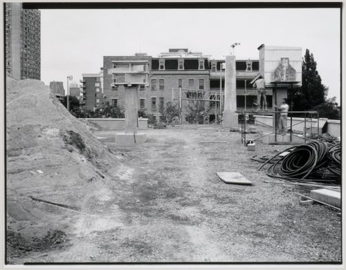 View of the Canadian Centre for Architecture Garden under construction showing workers installing an Allegorical Column, Montréal, Québec, Canada