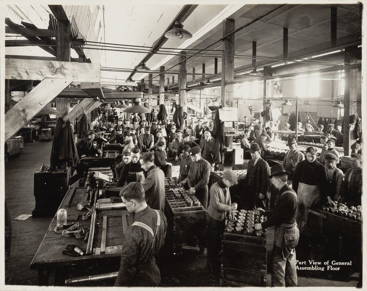 Interior view of workers on the general assembling floor of the Energite Explosives Plant No. 3, the Shell Loading Plant, Renfrew, Ontario, Canada