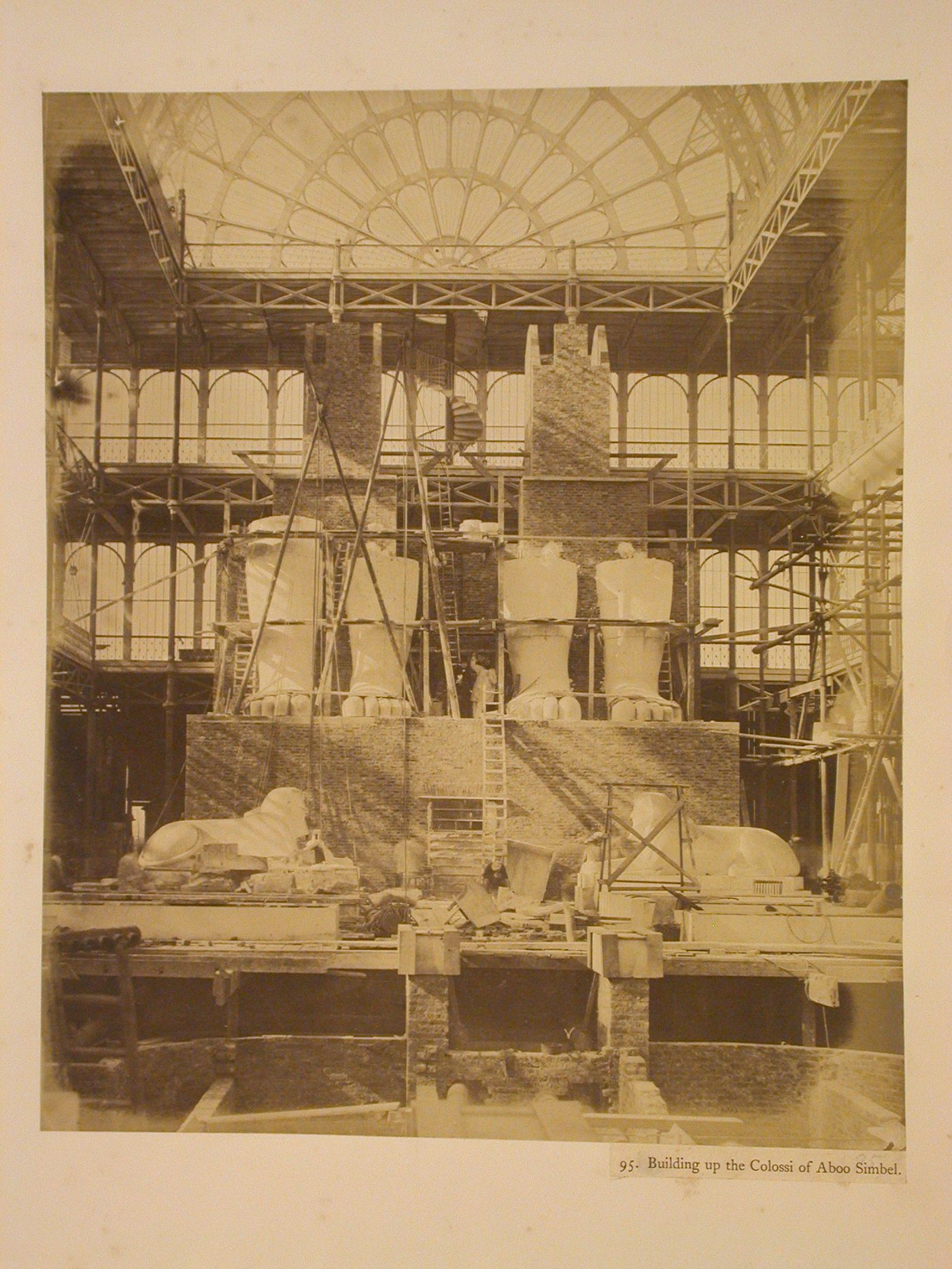 Building up the Colossi of Aboo Simbel, Crystal Palace, Sydenham, England