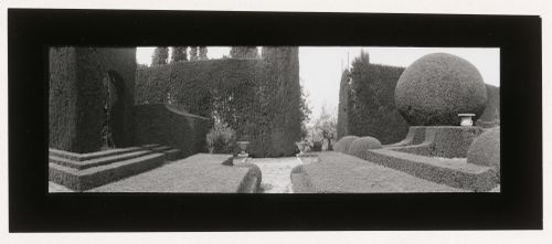 View of the Gamberaia gardens showing topiary and urns, Settignano, Florence, Italy