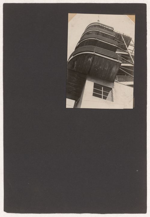 Worm's-eye view of an unidentified building showing a balcony, possibly in Germany