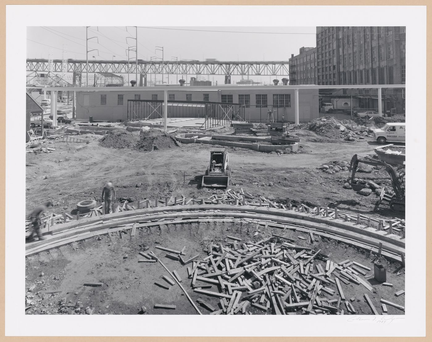 View of part of the Waterworks [?] under construction showing the Monorail track in the background, Louisiana World Exposition, New Orleans
