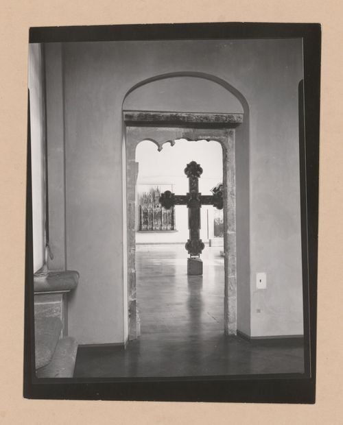 View of a gallery showing a doorway and a freestanding painted crucifix, Palazzo Abatellis, Galleria regionale della Sicilia, Palermo, Italy