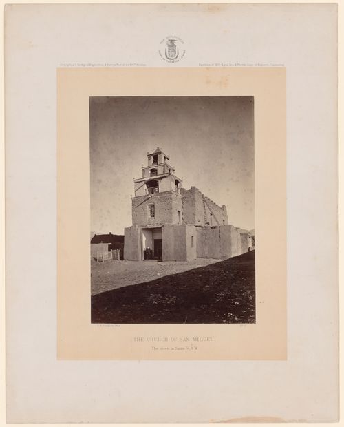 View of the Church of San Miguel with a priest in the doorway, Santa Fe, New Mexico, United States