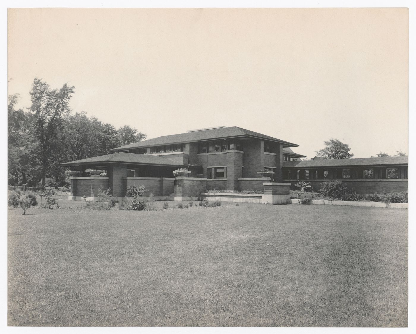 View of Darwin D. Martin House from the garden showing the east porch and part of the pergola, Buffalo, New York