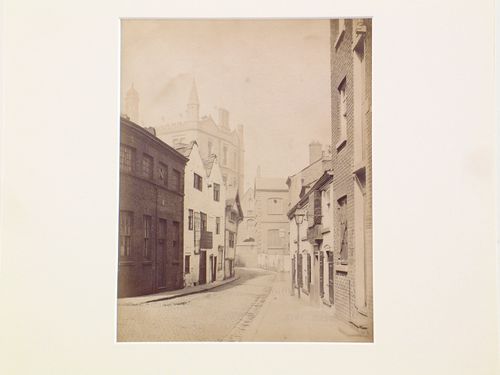 View of houses in Long Millgate, on both sides of street, Manchester, England