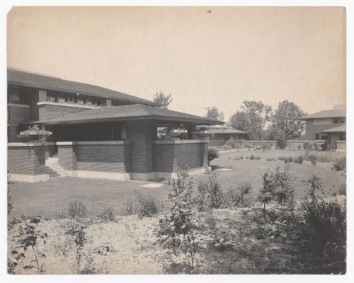 View of Darwin D. Martin House from Summit Avenue showing the cast porch over the floricycle with Barton House on the right, Buffalo, New York
