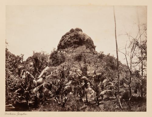 View of the At Vehara Kanda (also known as the Elephant Dagoba Peak) showing a building and staircase with trees in the foreground, Mihintale, Ceylon (now Sri Lanka)
