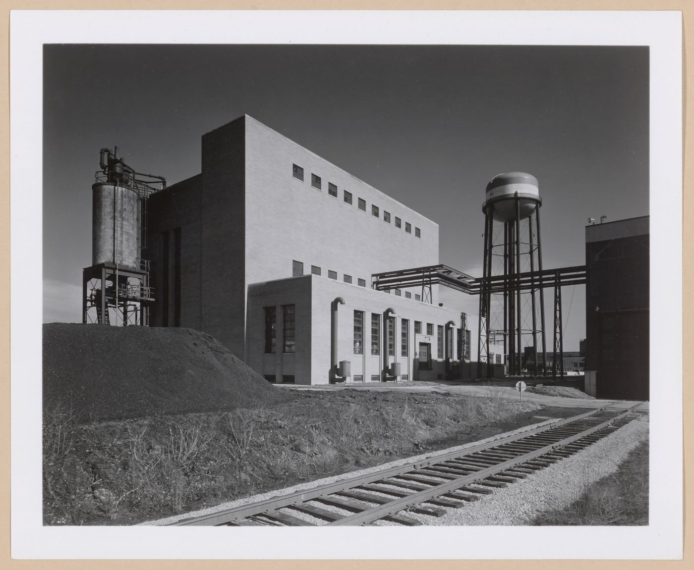 View of the south façade of the Boiler House showing the water tower, General Motors Corporation New Departure division Automobile [?] Assembly Plant, Sandusky, Ohio
