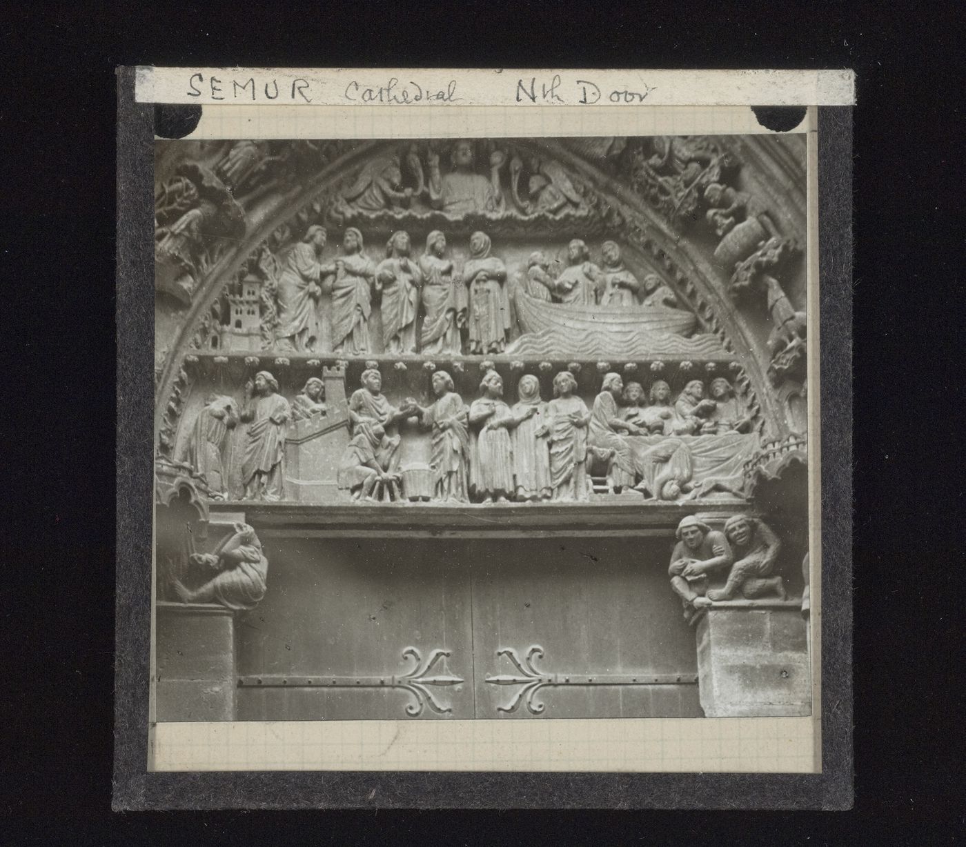 View of relief sculpture of north portal of cathedral, Semur-en-Auxois, Burgundy, France