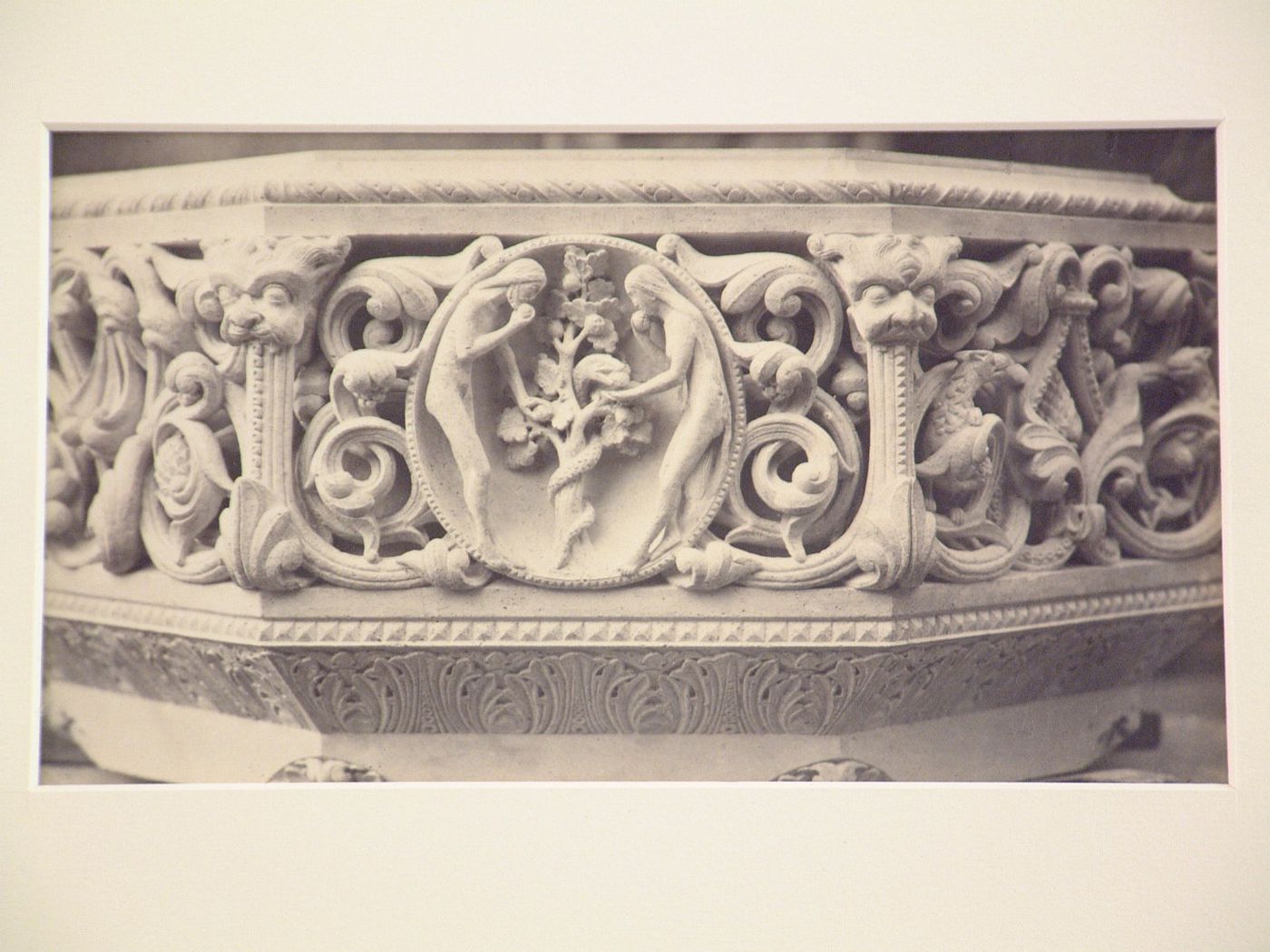 Font with Adam and Eve sculpture, unidentified church, France ?