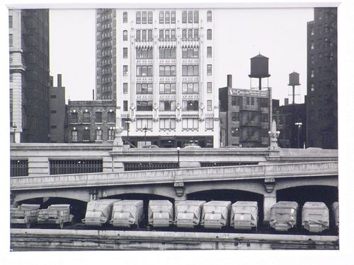Trucks parked on stone ramp structure, Chicago, Illinois
