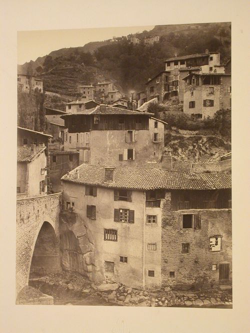 View of two houses built up a hill, Thiers, France