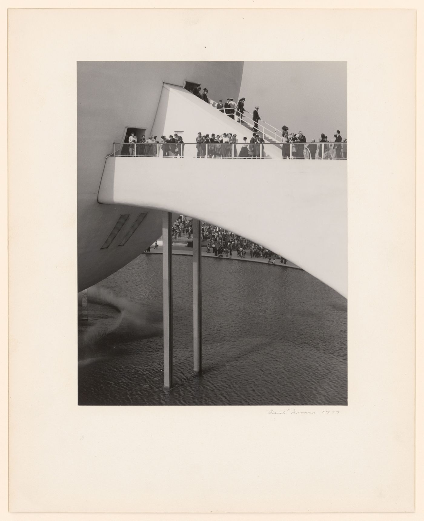 New York World's Fair (1939-1940): Close-up view of crowds moving from the Trylon into the Perisphere