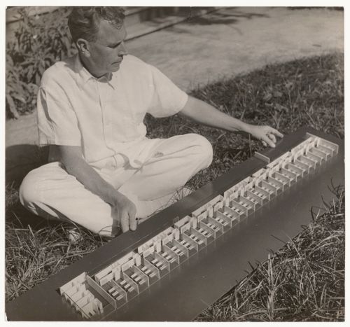 Photograph of Amancio Williams and model for Tres hospitales en Corrientes, Corrientes, Argentina