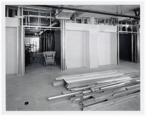 Interior view of the curatorial level [?] showing wall niches and studs stacked on the floor, Canadian Centre for Architecture under construction, Montréal, Québec