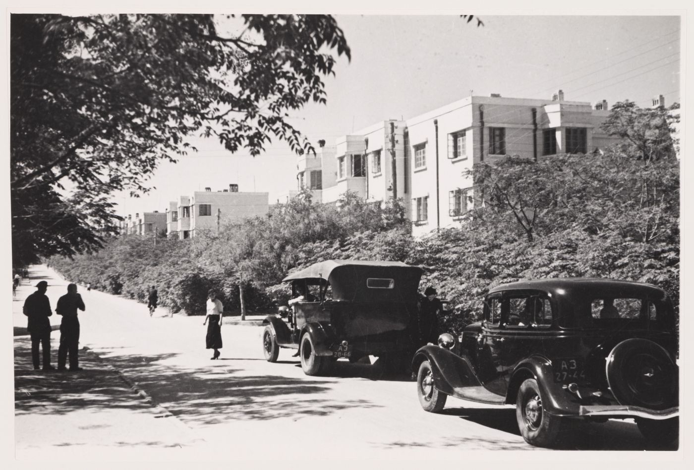 View of a street with housing in the background, Armenikend (Shaumian) settlement, Baku, Soviet Union (now in Azerbaijan)