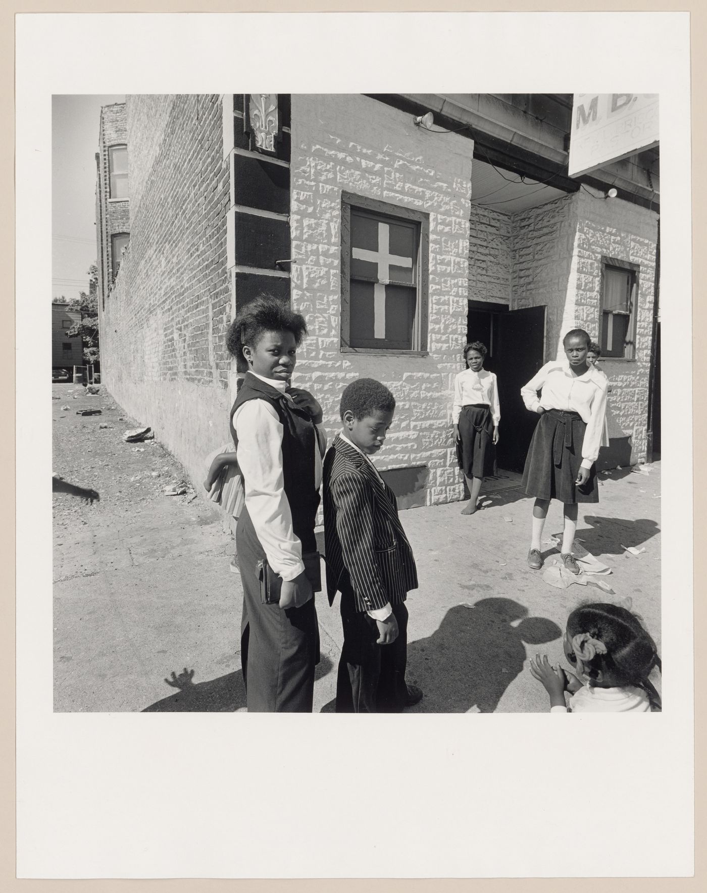 View of churchgoers in front of church, probably Chicago, United States