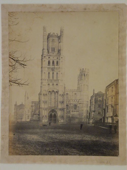 View across a field towards the west façade of Ely Cathedral, Ely, Cambridgeshire, England