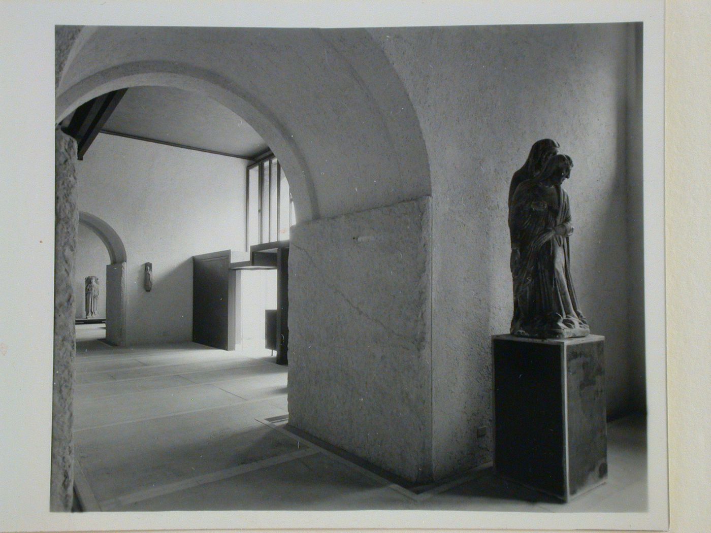Interior view of a gallery showing statues, doorways and an entrance, Museo di Castelvecchio, Verona, Italy