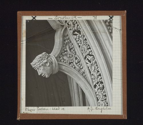 Detail view of choir screen with sculpture of head, Southwell Minster, Southwell, Nottinghamshire, England
