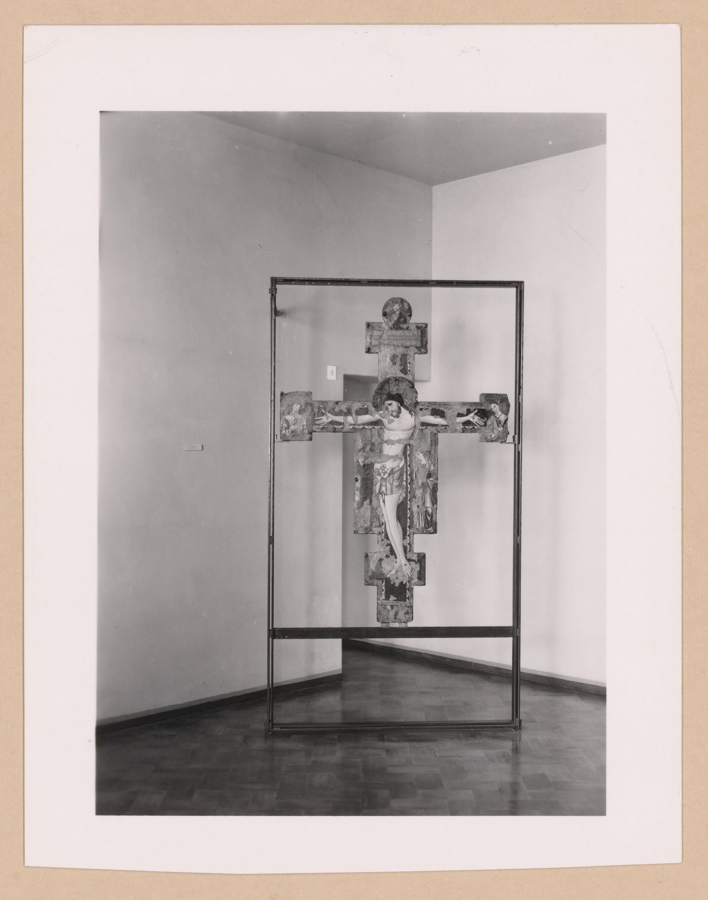 Interior view of the Sala della croce giunteesca showing a painted crucifix mounted on a metal easel, Palazzo Abatellis, Galleria regionale della Sicilia, Palermo, Italy