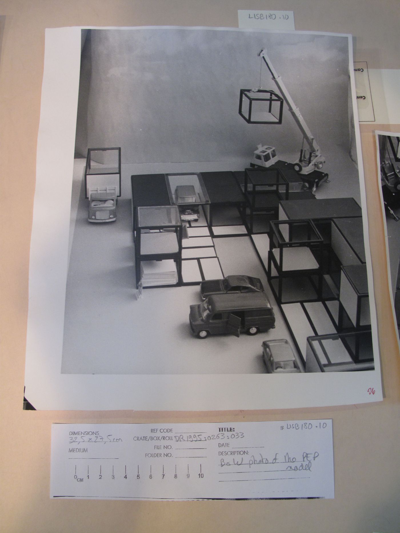 McAppy: view of elements from the model for the Portable Enclosures Programme (attached and stacked portable enclosures with five vehicles and crane)