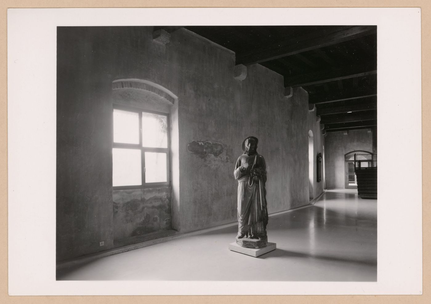Interior view of a gallery showing a statue and window, Museo di Castelvecchio, Verona, Italy