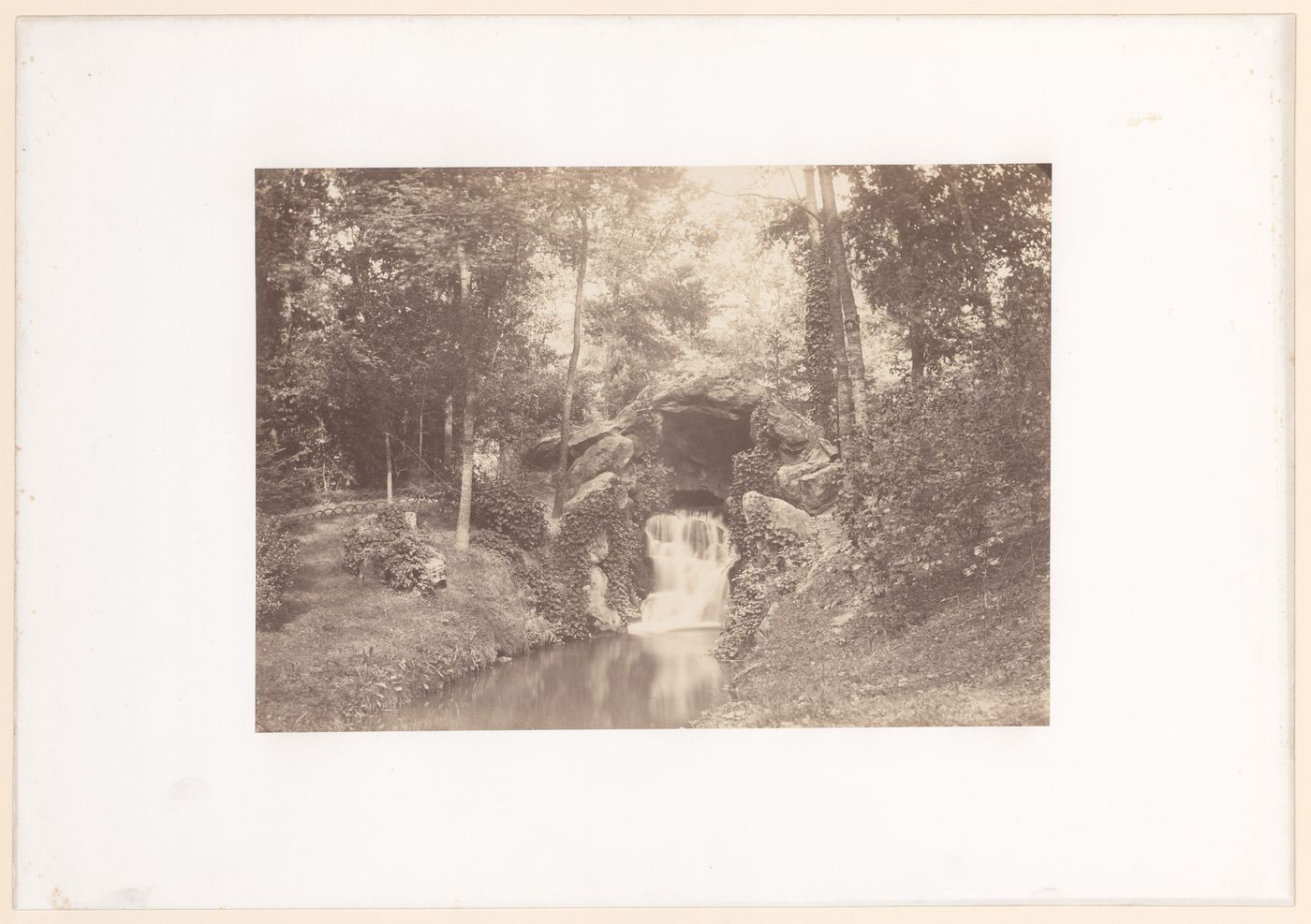 View of la petite grotte, vers la "Mare aux 1 biches", Bois de Boulogne, Paris, France