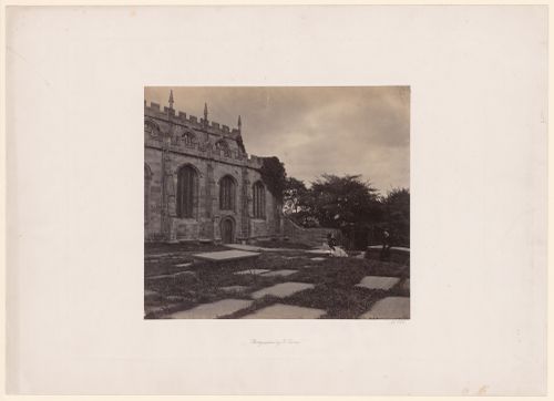 View of church or cathedral exterior, and churchyard, with two figures, Chester [?], England