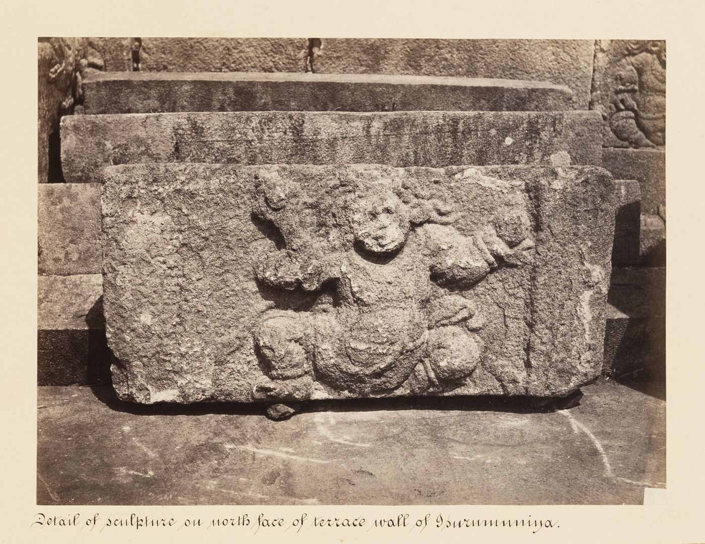 Close-up view of a relief on the north façade of the terrace wall, Isurumuniya Temple, Anuradhapura, Ceylon (now Sri Lanka)