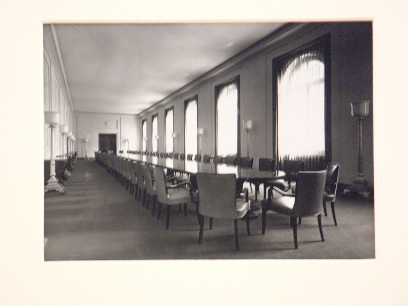 Interior of very long conference room, with very long table