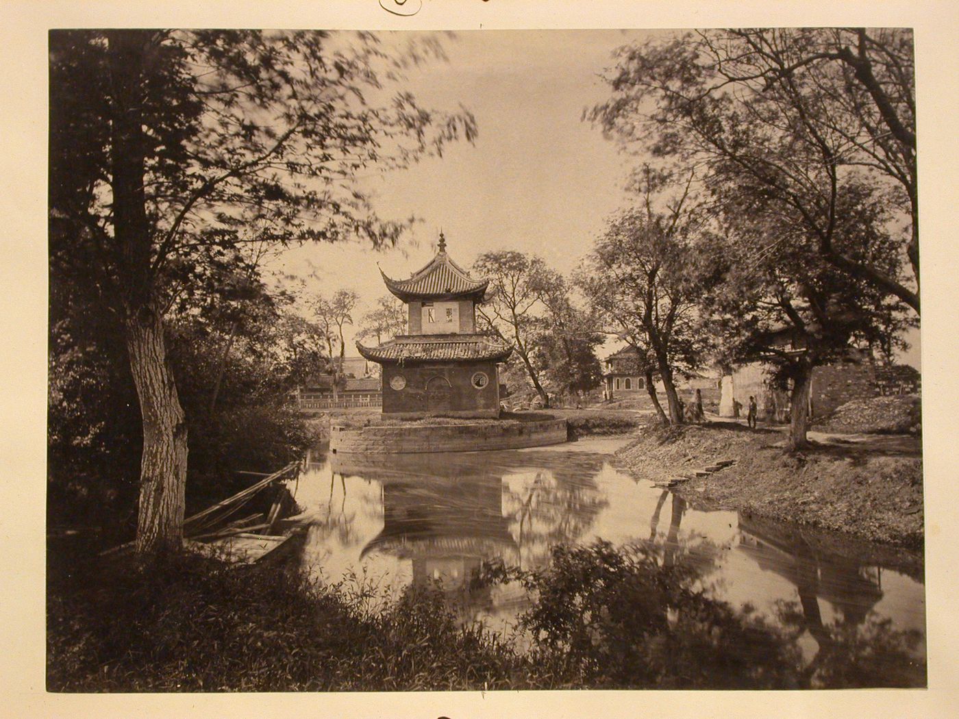 Vignette of pavillion by a pond in the outskirts of Ningpo (now Ningbo Shi), Cheh-kiang Province (now Zhejiang Sheng), China