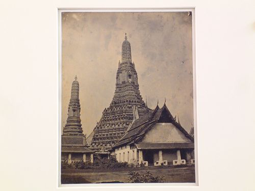 View of the phra prang, a stupa and a temple building, Wat `Arunratchawararam (also known as Wat Arun) temple complex, Bangkok, Siam (now Thailand)